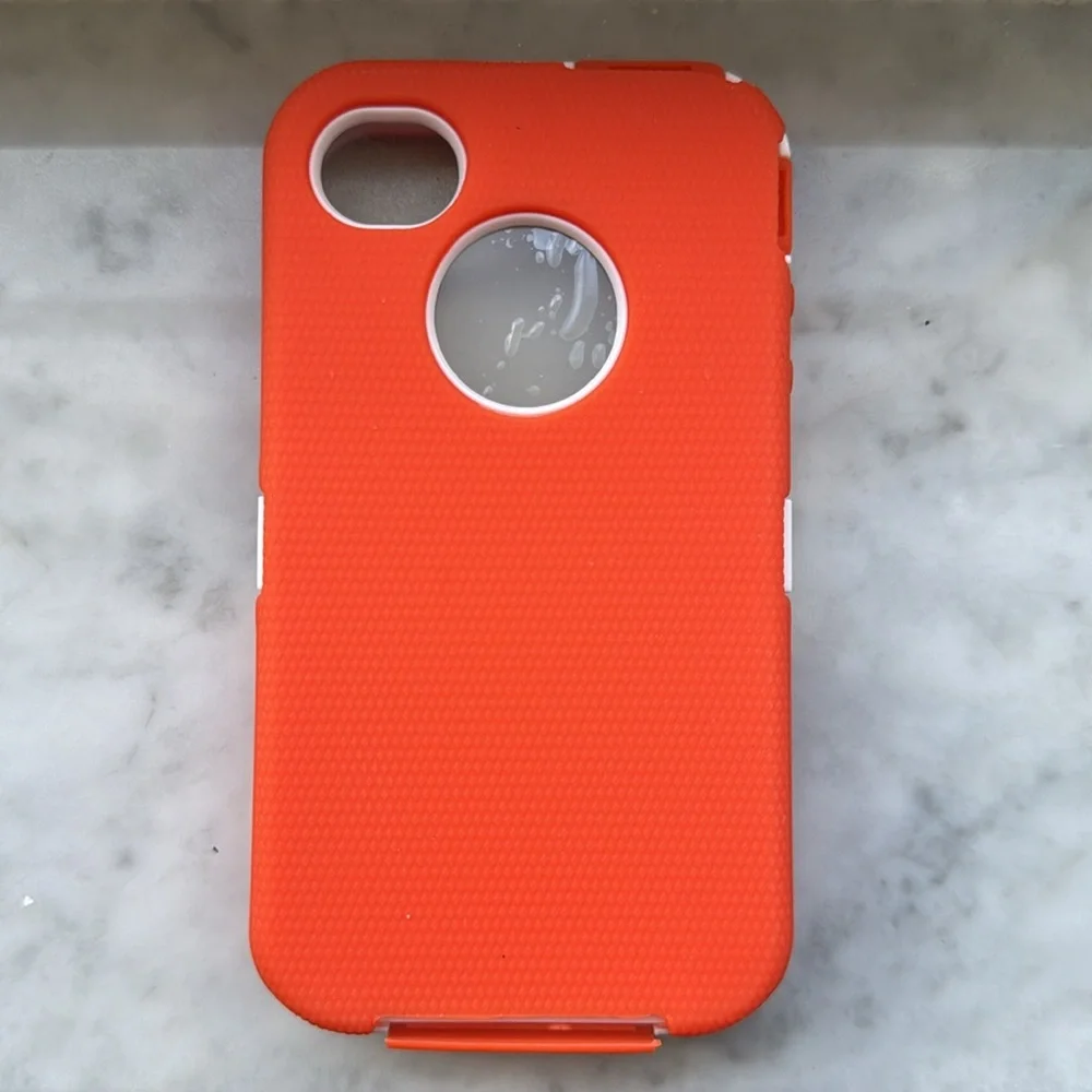 Orange over white defender case for iPhone 4/4s